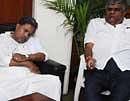 Opposition is not sleeping here: Opposition leader Siddaramaiah and JDLP Leader HD Revanna at the lounge at Vidhana Soudha during Dharna by Opposition parties in Bangalore on Tuesday. -KPN