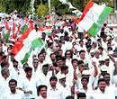 Congress supporters during the first day of the party's 'Paadayatra' from Bangalore to Bellary, in Bangalore on Sunday. PTI Photo