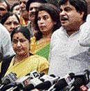 Leader of Opposition in the Lok Sabha Sushma Swaraj and BJP president Nitin Gadkari talk to the media after submitting a memorandum to President Pratibha Patil in New Delhi on Thursday. Pti