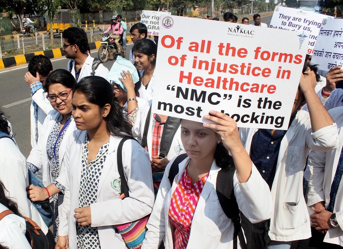 Medical students observe black day during a protest rally against NMC (National Medical Commission) in Bhubaneswar. PTI File Photo