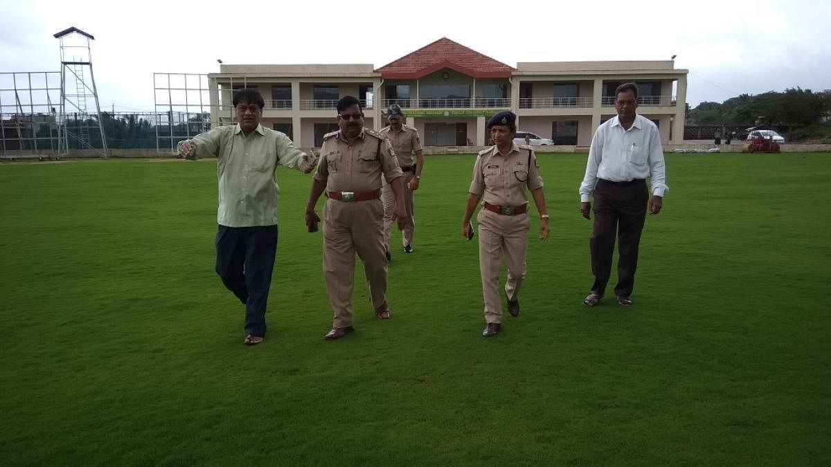 Police officials inspect the KSCA stadium in Belagavi.