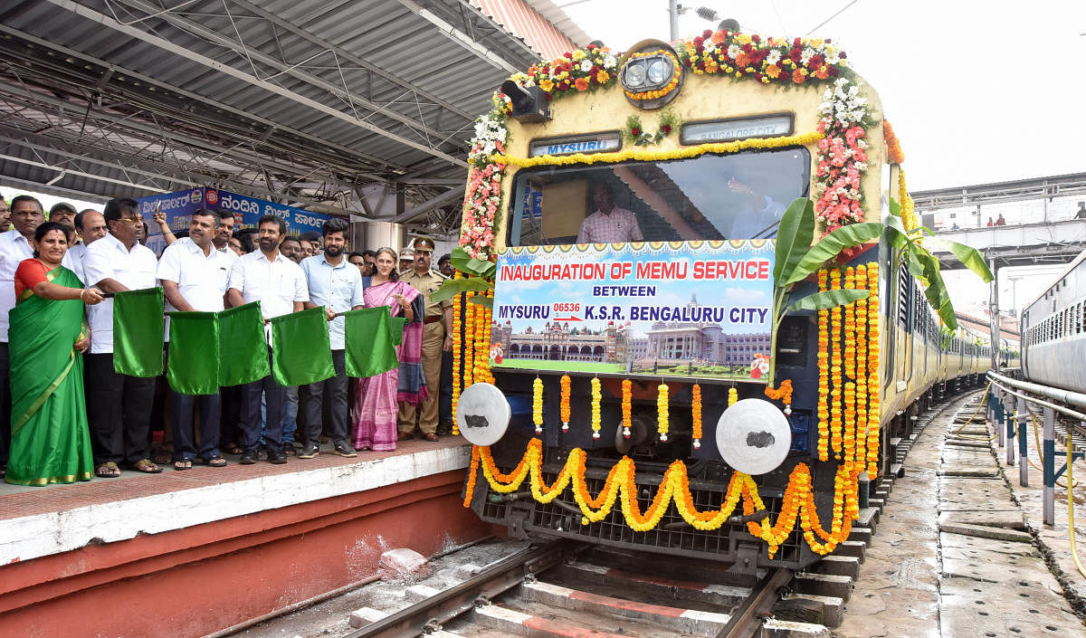 MP Prathap Simha flags off Mainline Electric Multiple Unit (MEMU) train in Mysuru on Sunday. Mayor Pushpalatha Jagannath, MLA L Nagendra, MLC Sandesh Nagaraj, Maritibbegowda, Divisional Railway Manager Aparna Garg, Additional Divisional Railway Manager Aj