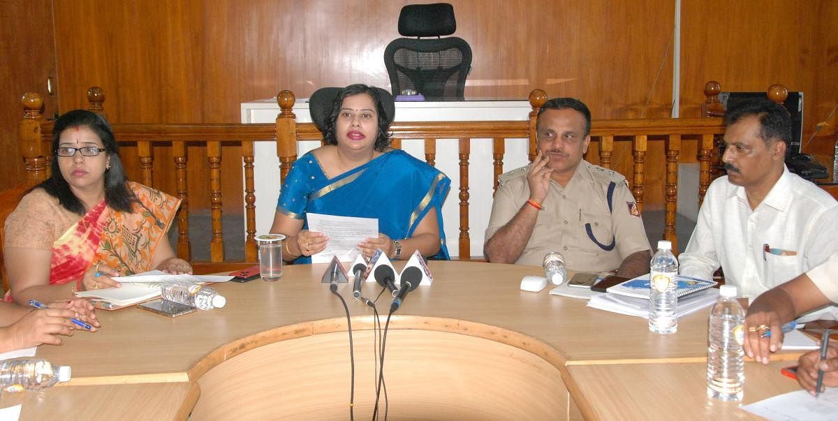 Deputy Commissioner N Manjushri during a meeting in connection with the Lok Sabha elections in Mandya on Monday. Additional DC M J Roopa, Additional SP Balaramegowda and ZP CEO K Yalakkigowda are seen. dh photo