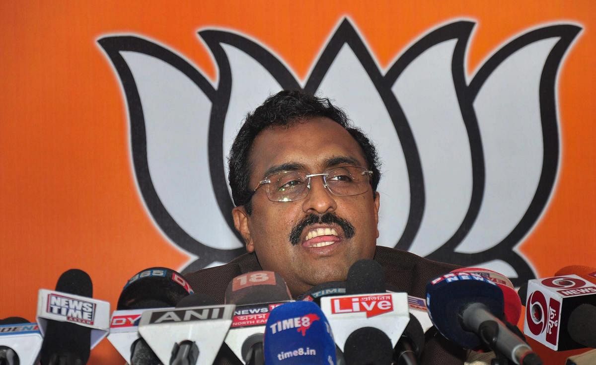 BJP National General Secretary Ram Madhav addresses a press conference at Assam state BJP office, in Guwahati on Sunday. PTI photo