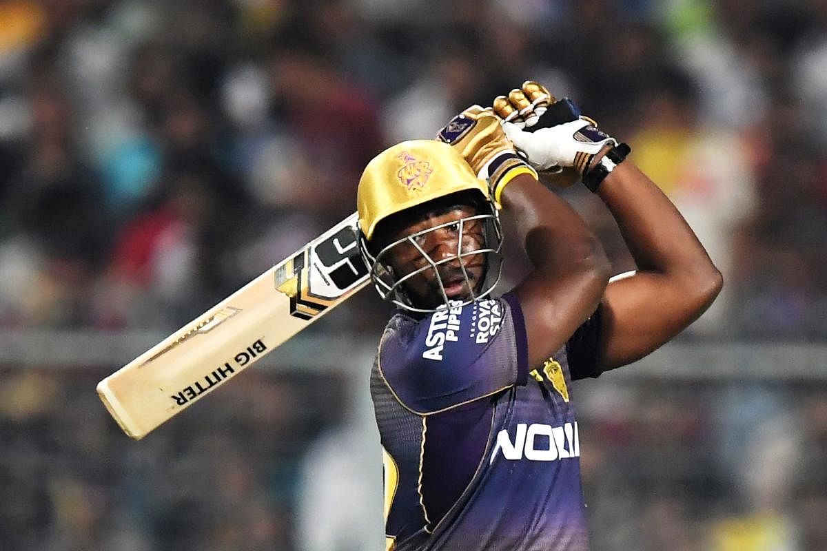 Kolkata Knight Riders' Andre Russell slams one to the fence during his explosive 49 not out against Sunrisers Hyderabad on Sunday. AFP
