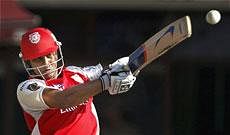 Kings XI Punjab's Paul Valthaty plays a shot against Delhi Daredevils during their IPL-4 match in Dharamshala on Sunday. PTI
