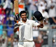 Ravichandran Ashwin acknowledges the crowd after scoring a century during the fourth day of the third cricket test match against India in Mumbai on Friday. AP