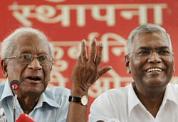 CPI leaders A.B. Bardhan and D. Raja during a press conference for the release of "Draft of the Party Programme" at party office in New Delhi on Thursday. PTI