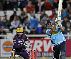 Auckland Aces Azhar Mahmood, right, plays a shot during the Champions League Twenty20 cricket game against Kolkata Knight Riders in Cape Town, South Africa, Monday, Oct 15, 2012. (AP Photo)