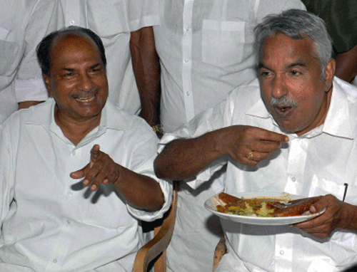 Defence minister A. K. Antony with Kerala Chief Minister Oommen Chandy at Ernakulam on Sunday. PTI Photo