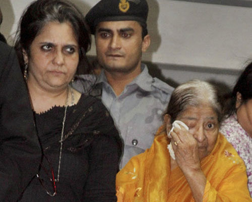 Zakia Jafri, wife of Ehsan Jafari cries during a media interaction as metropolitan magistrate rejected the petition and gave clean chit to Gujarat Chief Minister Narendra Modi in 2002 Gulbarg society case, in Ahmedabad on Thursday.File Photo - PTI