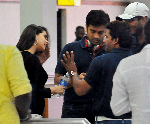 Malayalam actress Bhavana with players of Kerala Strikers at Kochi International Airport on Friday. The team members were forced to disembark from a Hyderabad-bound flight after allegations of misbehaviour with the crew members at the airport. PTI Photo