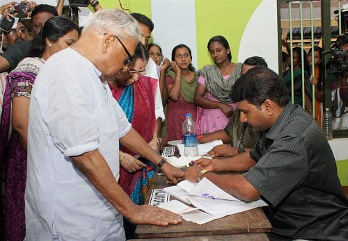 VS Achuthananthan voting for the Lok Sabba Election in Kochi on Thursday. PTI Photo