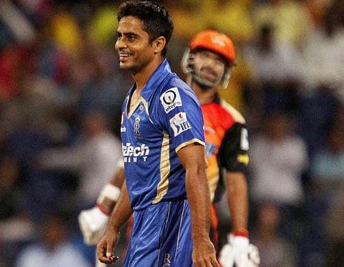 Rajat Bhatia of the Rajatshan Royals is all smiles after dismissing Shikhar Dhawan captain of the Sunrisers Hyderabad during IPL 7 match in Abu Dhabi, United Arab Emirates on Friday. PTI Photo