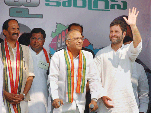 Rahul Gandhi at an election rally in Mahboob Nagar district on Monday. Union minister S Jaipal Reddy is also seen. PTI Photo