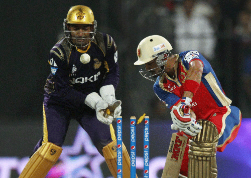 Virat Kohli captain of the Royal Challengers Bangalore loses his wicket during their IPL 7 match against Kolkata Knight Riders in Sharjah on Thursday. PTI Photo/BCCI