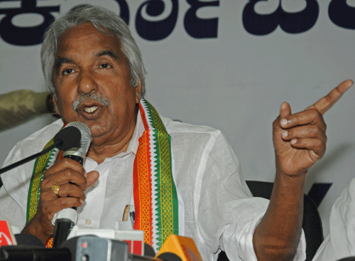 Kerala Chief Minister Oommen Chandy and Home Minister Ramesh Chennithala held talks with Kerala Pradesh Congress Committee (KPCC) president V M Sudheeran, who strongly opposed the reopening of the bars that have been closed since April 1. DH File Photo