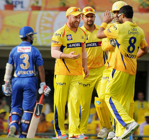 Players of the Chennai Super Kings celebrate the wicket Ajinkya Rahane of the Rajasthan Royals during their IPL 7 match in Ranchi on Tuesday. PTI