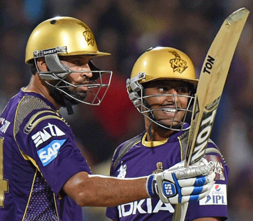 KKR Yusuf Pathan raises celebrates his half century during IPL match againist Sunrisers Hyderabad at Eden Garden in Kolkata on Saturday. PTI Photo