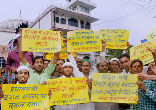 Muslims holding a demonstration protest for the safe return of the Indians trapped in Mosul city of Iraq, in Ranchi on Friday. PTI Photo