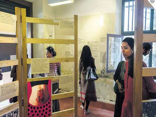 Visitors at Malayalam Project exhibition Kochi-Muziris Biennale in Kochi.