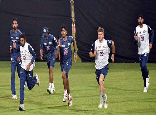 Mumbai Indians cricketers in a practice session at Eden Garden in Kolkata on Tuesday. PTI Photo