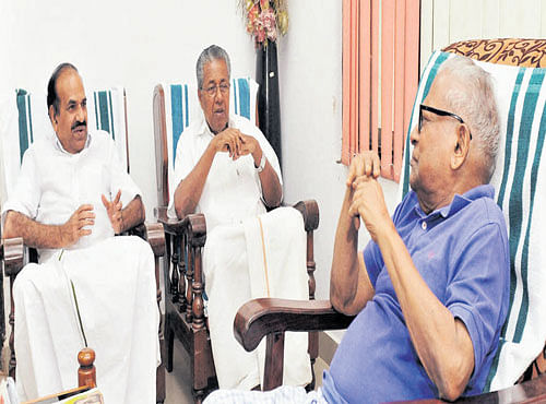 CPM leader Kodiyeri Balakrishnan, chief minister-designate Pinarayi Vijayanmeet party veteran VS Achuthanandan in Thiruvananthapuram on Saturday. PTI