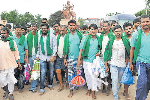 Farmers from Navalgund, arrested in connection with the violence during Mahadayi protests, walk out of the central jail in Ballari on Saturday. dh Photo