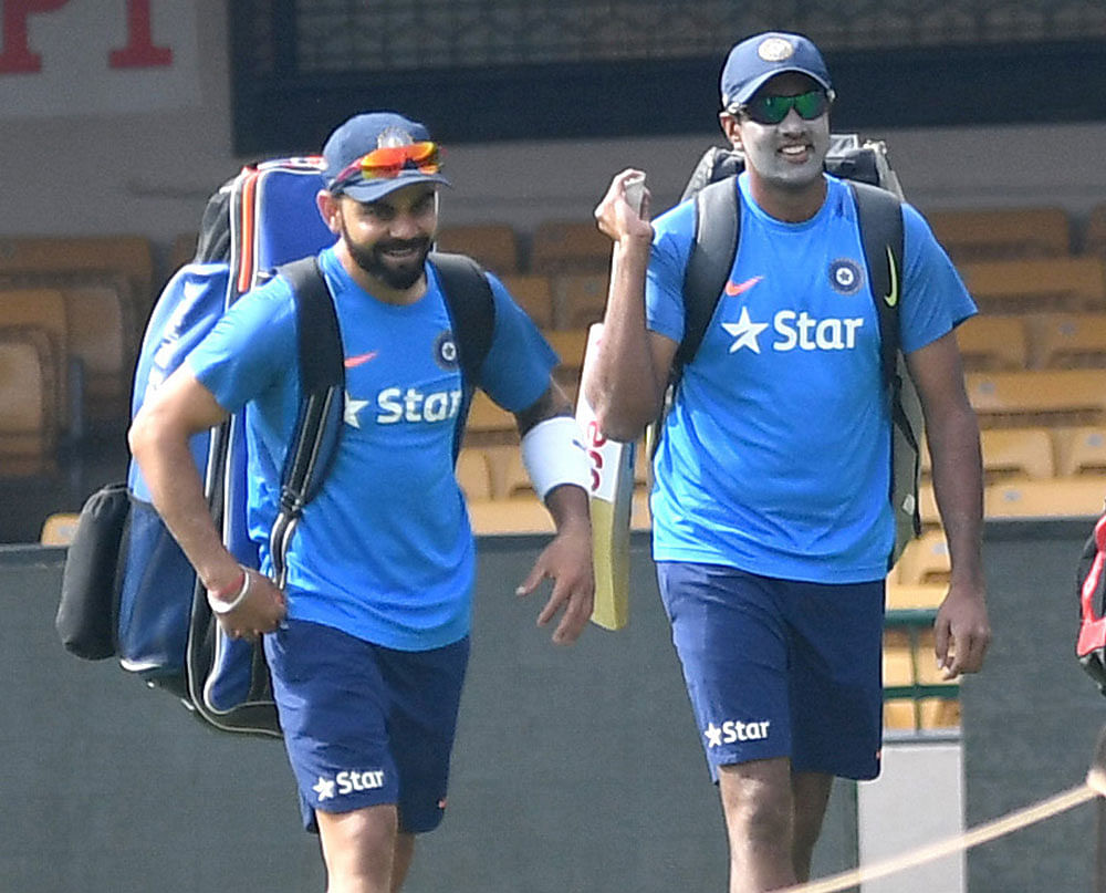 Indian captain Virat Kohli and R Ashwin during the practice session at Chinnaswamy Stadium, Bengaluru. DH File photo