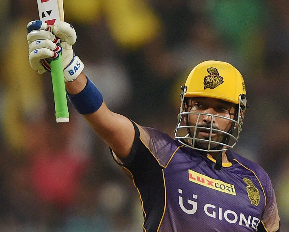 KKR batsman Robin Uthappa acknowledging crowds after complete his half century during IPL Match against Gujarat Loins in Kolkata on Friday. PTI Photo