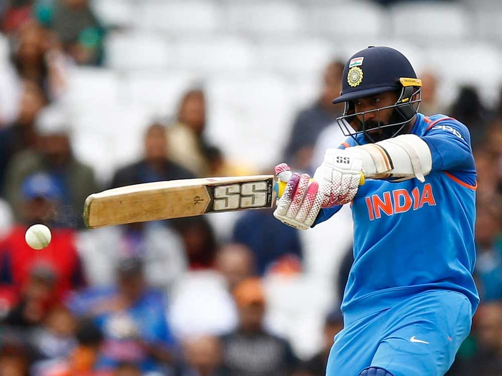 By his own admission, Karthik needed the knock against Bangladesh after scoring a nervous nine-ball duck in India's first warm-up match against New Zealand. Photo credit: PTI.