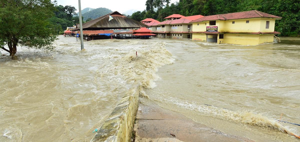 The river Pampa breached its banks on Monday, flooding shops, pilgrim facilities and the mandapam on the foothills of Sabarimala. Photo by special arrangement