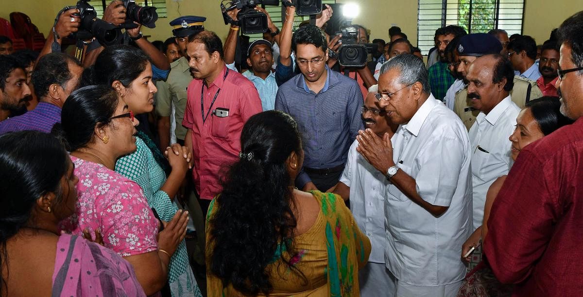 Kerala Chief Minister Pinarayi Vijayan during a visit to a relief camp at Kozhencherry, in Pathanamthitta on Thursday, Aug 23, 2018. (PTI Photo)