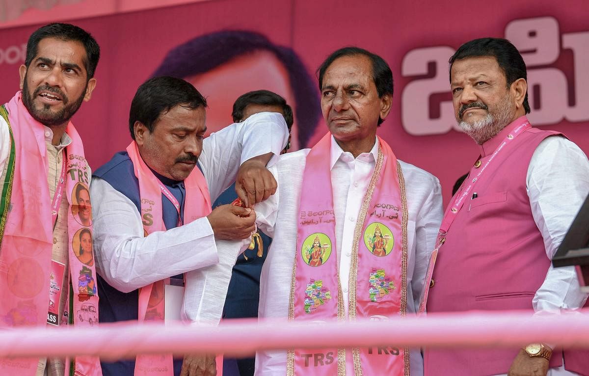 TRS Supremo and Telangana caretaker Chief Minister K Chandrasekhar Rao with party leaders at a public meeting in Nizamabad, on October 3, 2018. PTI