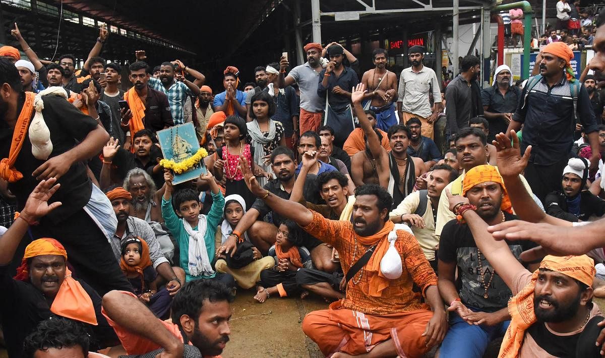 Protesters oppose the entry of women to the Sabarimala Temple, Kerala, on Friday. PTI