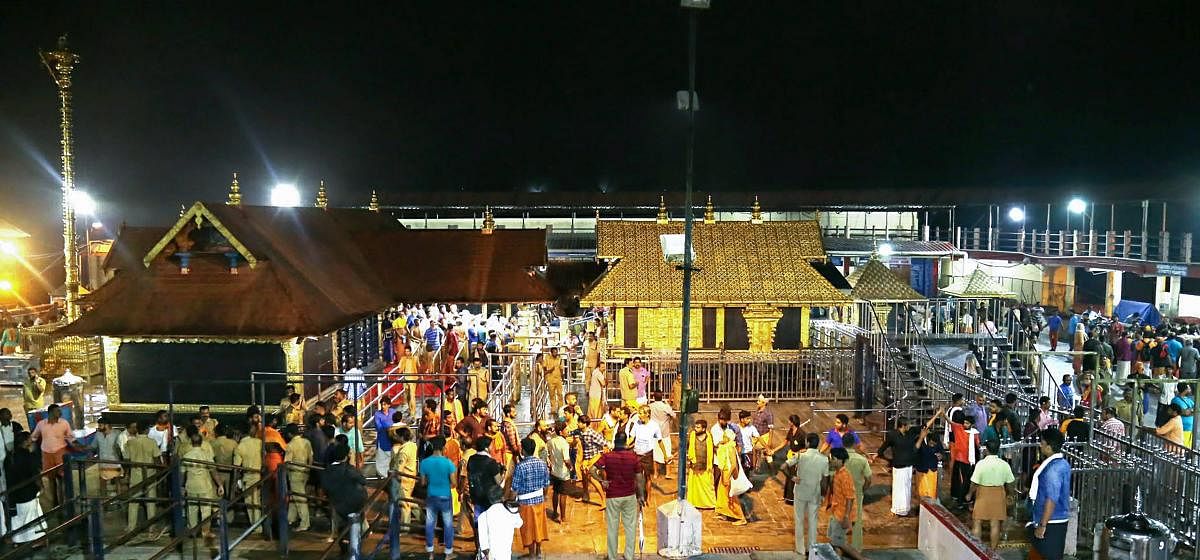 Devotees pay obeisance Lord Ayyappa temple in Sabarimala. (PTI file photo)