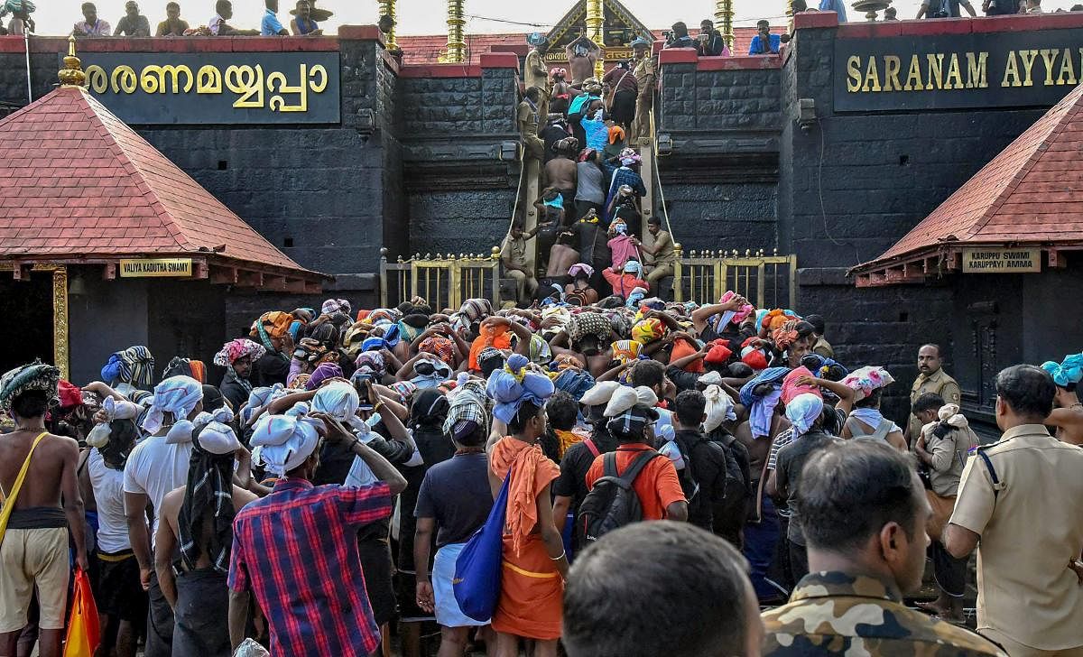Devotees arrive at Sabarimala Temple, in Pathanamthitta, on November 5, 2018. PTI