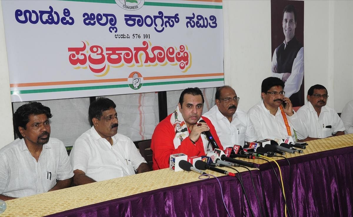 Congress and JD(S) coalition candidate Pramod Madhwaraj speaks to mediapersons in Udupi on Sunday. 