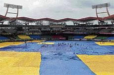 All Doom and Gloom: Incessant rains forced the first one-dayer at the Jawaharlal Nehru stadium in Kochi to be abandoned without a ball being bowled. AP