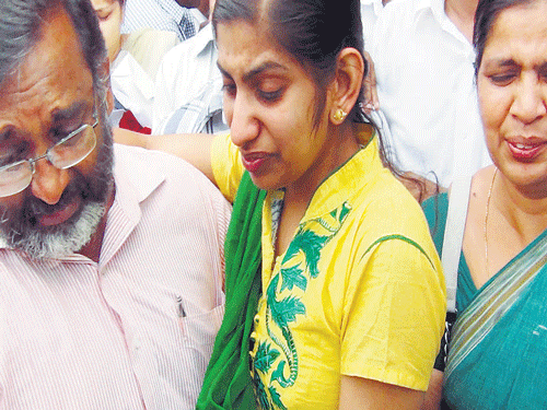 Neena Joseph with her family on arrival at the Cochin  International Airport. DH photo