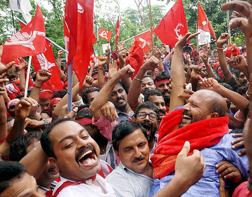 LDF supporters celebrating their victory in Assembly polls in Thrissur on Thursday. PTI Photo