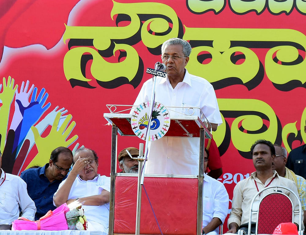 Kerala Chief Minister Pinarayi Vijayan addresses a gathering during 'Karavali Souharda Rally' a harmony meet organised by Communist Party of India (Marxists), at Nehru Maidan in Mangaluru on Saturday. DH Photo/ Govindraj Javali