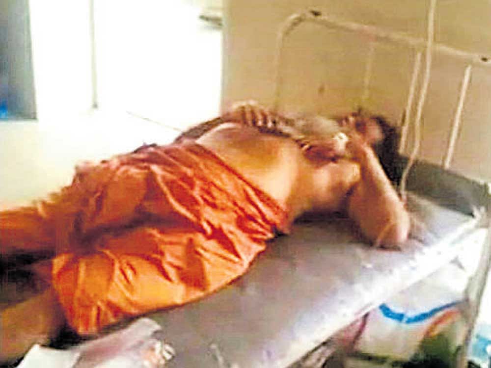 Sreehari lies on the hospital bed where he was admitted for treatment.