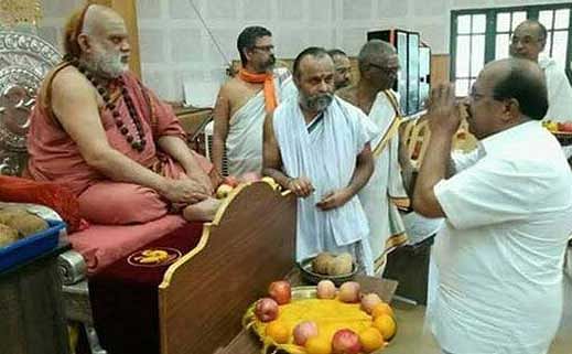 PWD Minister G Sudhakaran meeting Sri Bharati Tirtha of the Sringeri Sarada Peetham in Alappuzha. Photo: Facebook/K Surendran.
