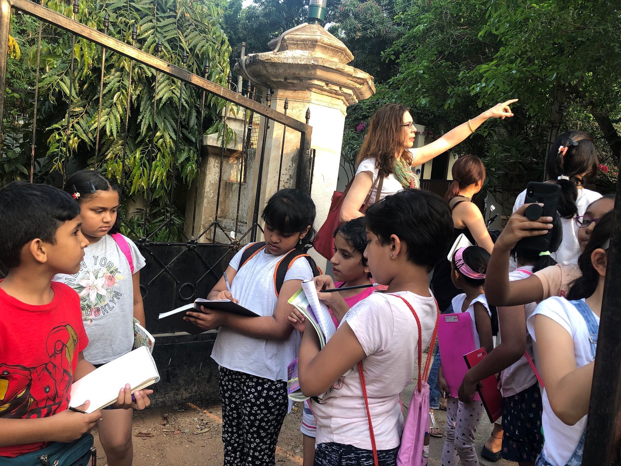 The participants near a bungalow on Prime Street, at one of the visits