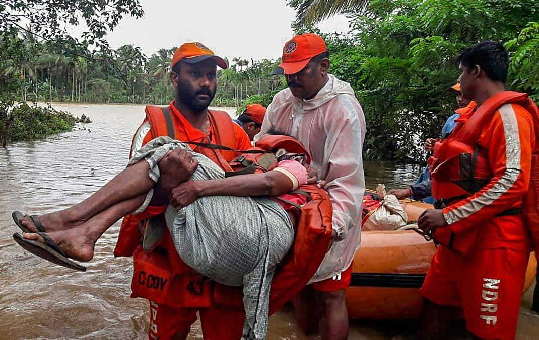 Wayanad: NDRF personnel rescue the flood-hit people in Wayanad, Kerala. PTI photo