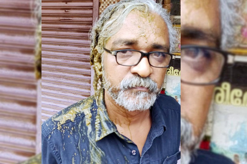 Cow dung was poured on national award-winning filmmaker Priyanandanan at Thrissur in Kerala on Friday morning. (Image courtesy Twitter)