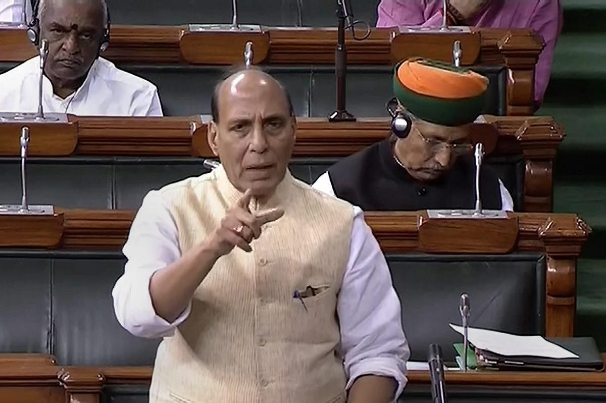 New Delhi: Union Home Minister Rajnath Singh speaks in the Lok Sabha during the Monsoon session of Parliament, in New Delhi on Tuesday, Aug 07, 2018. (LSTV Grab via PTI) (PTI8_7_2018_000065B)