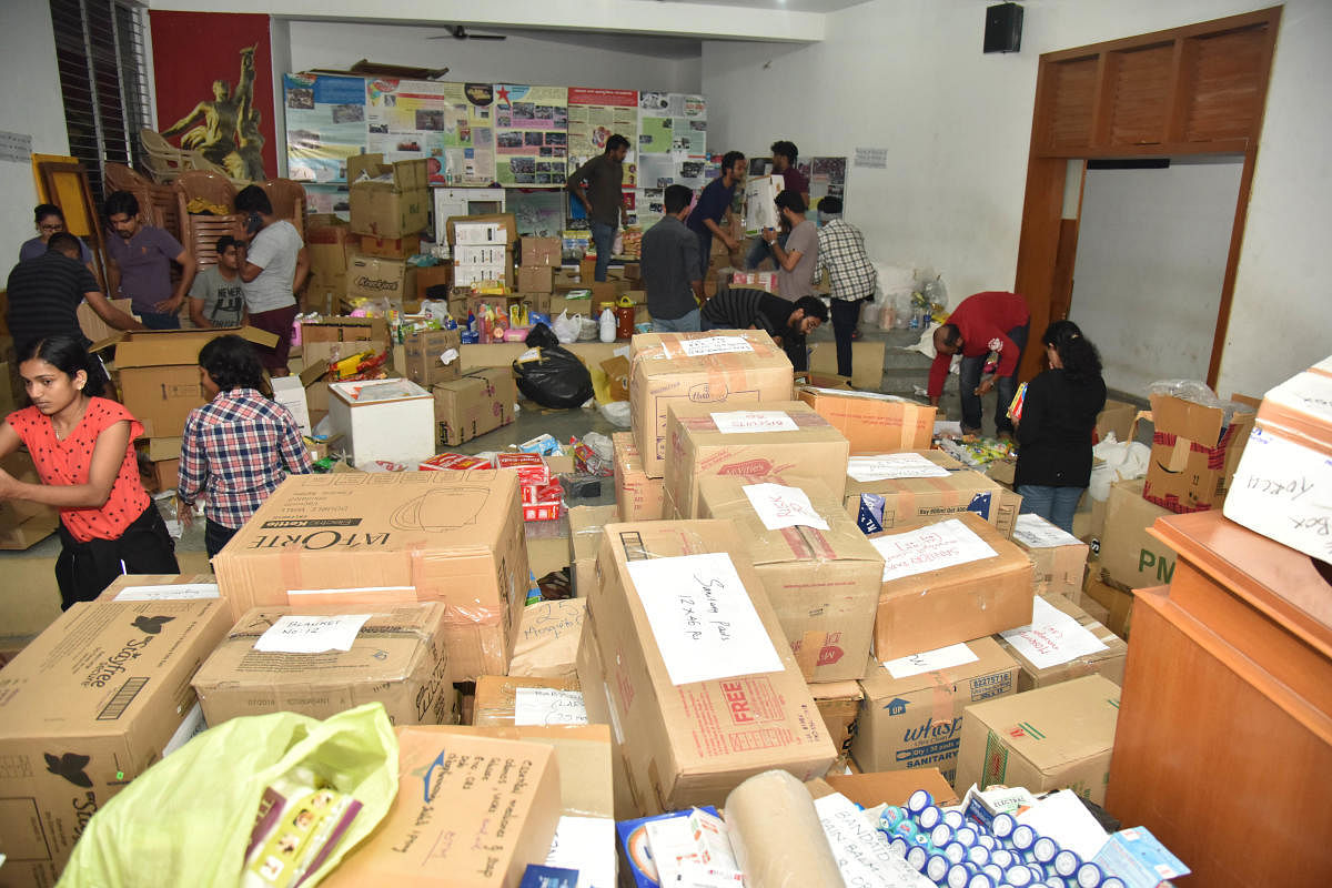 Relief material sourced from 33 collection centres operated under the banner 'Kerala Flood Relief Campaign' are being sent to EMS Bhavan in Yeswanthpur. These are then segregated and sent by truck to Kalpetta in Wayanad district of Kerala.