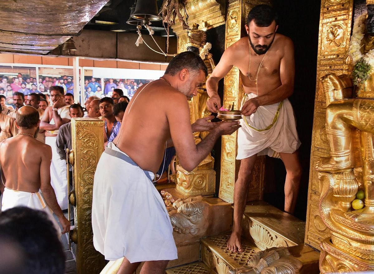 A senior Kerala minister on Saturday attacked the Sabarimala temple's Tantri (chief priest), calling him a "Brahmin monster" for conducting a 'purification' ceremony after two women in the menstrual age group entered the shrine.  File photo